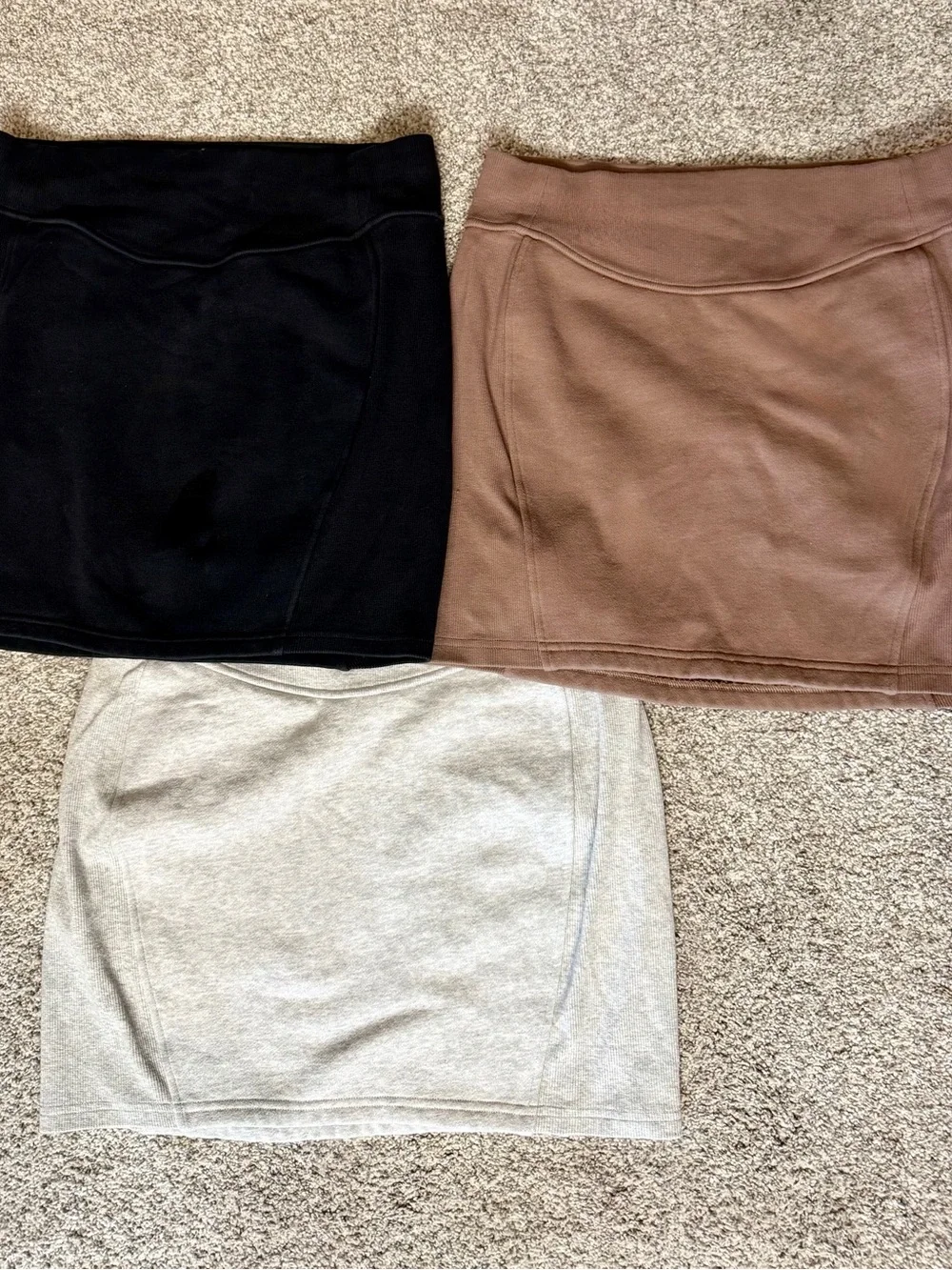 3 pack lululemon Scuba High Rise Mini Skirt Trio in Black, Taupe, and Gray